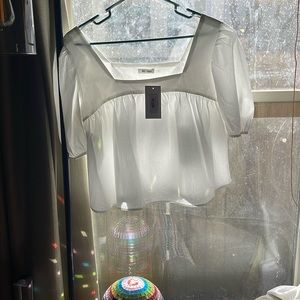 White flutter sleeve top